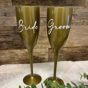 Champagneglazen goud/wit Bride & Groom